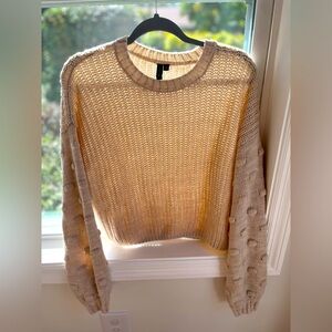 cream colored moon&madison sweater with detailed puffy sleeves